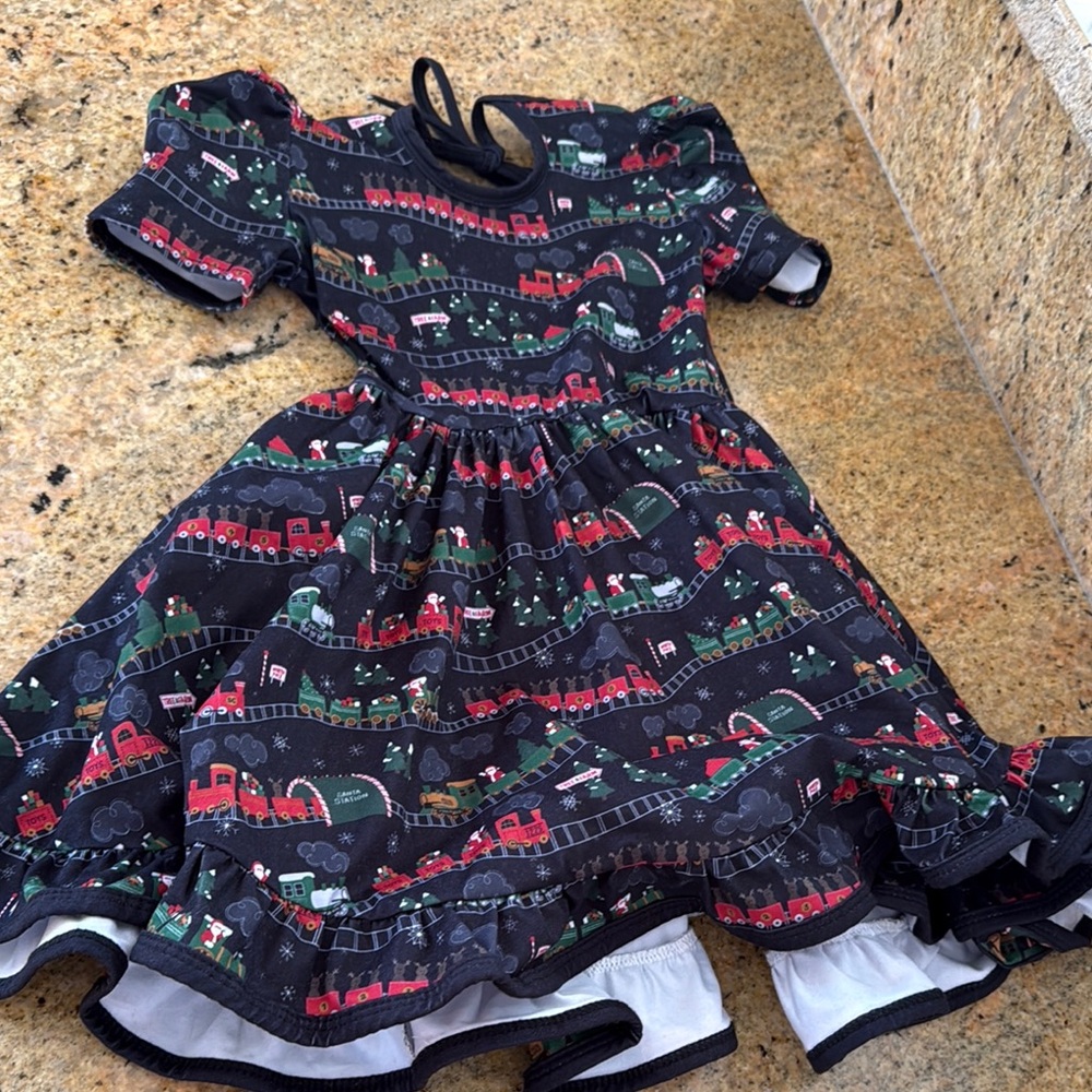 Little Stocking Co. Holiday Train Patterned Dress
